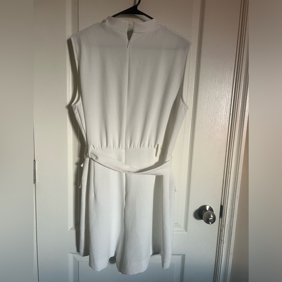 White romper with gold buttons on shoulder. - Picture 3 of 3